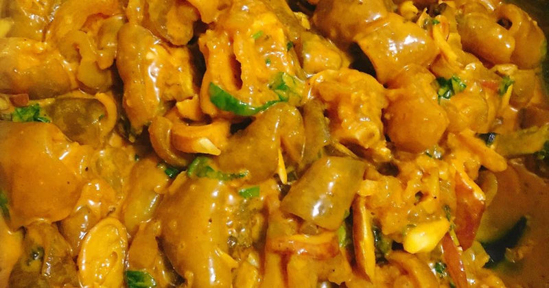 NKWOBI DELICIOUS COW FEET SAUTEED WITH UTAZI (FULL PLATE SERVICE FOR 4 PERSONS IN SMALL ALUMINUM TRAY)